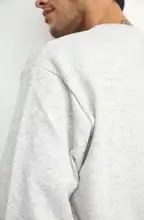 Ver foto 7: Buzo de frisa cuello redondo gris claro, detalle de la tela